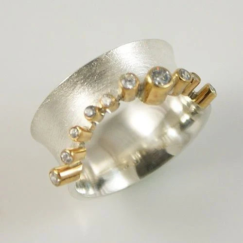Bague vintage en argent incrusté de zirconium et d'or