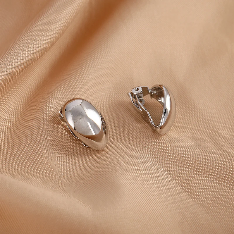 Boucles d'oreilles élégantes en or et argent