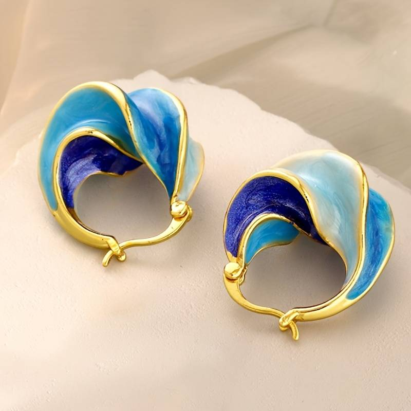 Boucles d'oreilles en émail bleu et or vintage