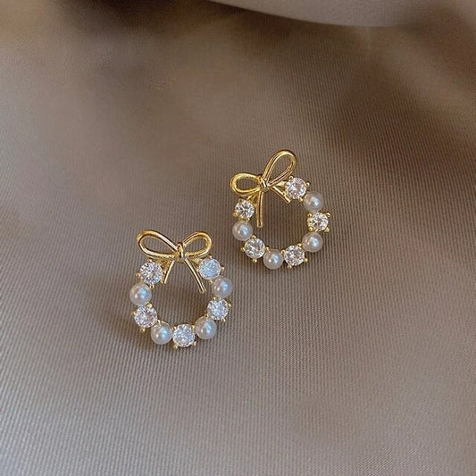 Boucles d'Oreilles de Nœud de Noël avec Perles et Zircons en Or