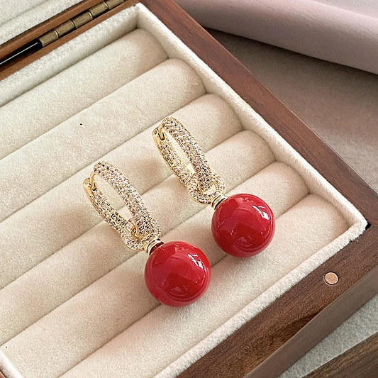 Boucles d'oreilles élégantes en perles rouges