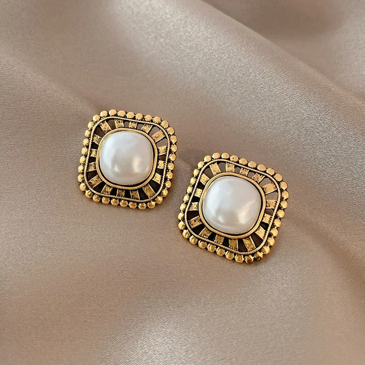 Boucles d'oreilles plaquées or avec perles incrustées