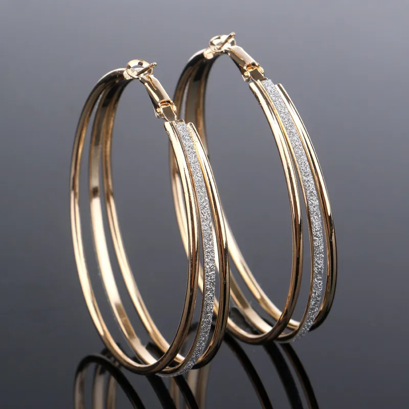 Boucles d'oreilles vintage plaquées or et brillantes