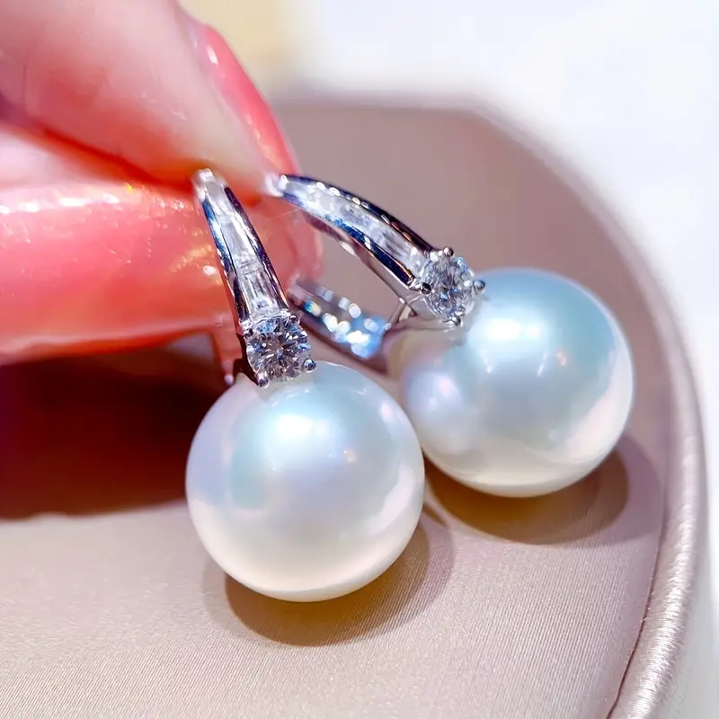 Boucles d'oreilles élégantes en perles avec zircons